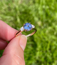 Load image into Gallery viewer, Tanzanite and diamond trilogy ring in yellow gold
