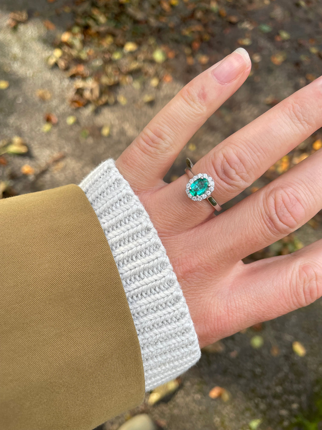 Emerald and Diamond Halo Cluster ring in 18ct White Gold