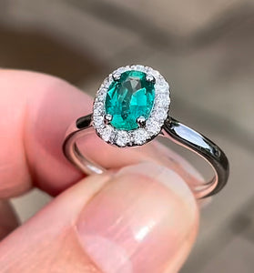 Emerald and Diamond Halo Cluster ring in 18ct White Gold