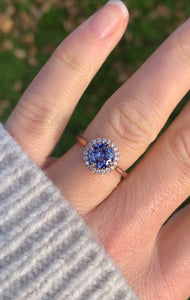 Tanzanite and Diamond Halo Ring in Rose Gold